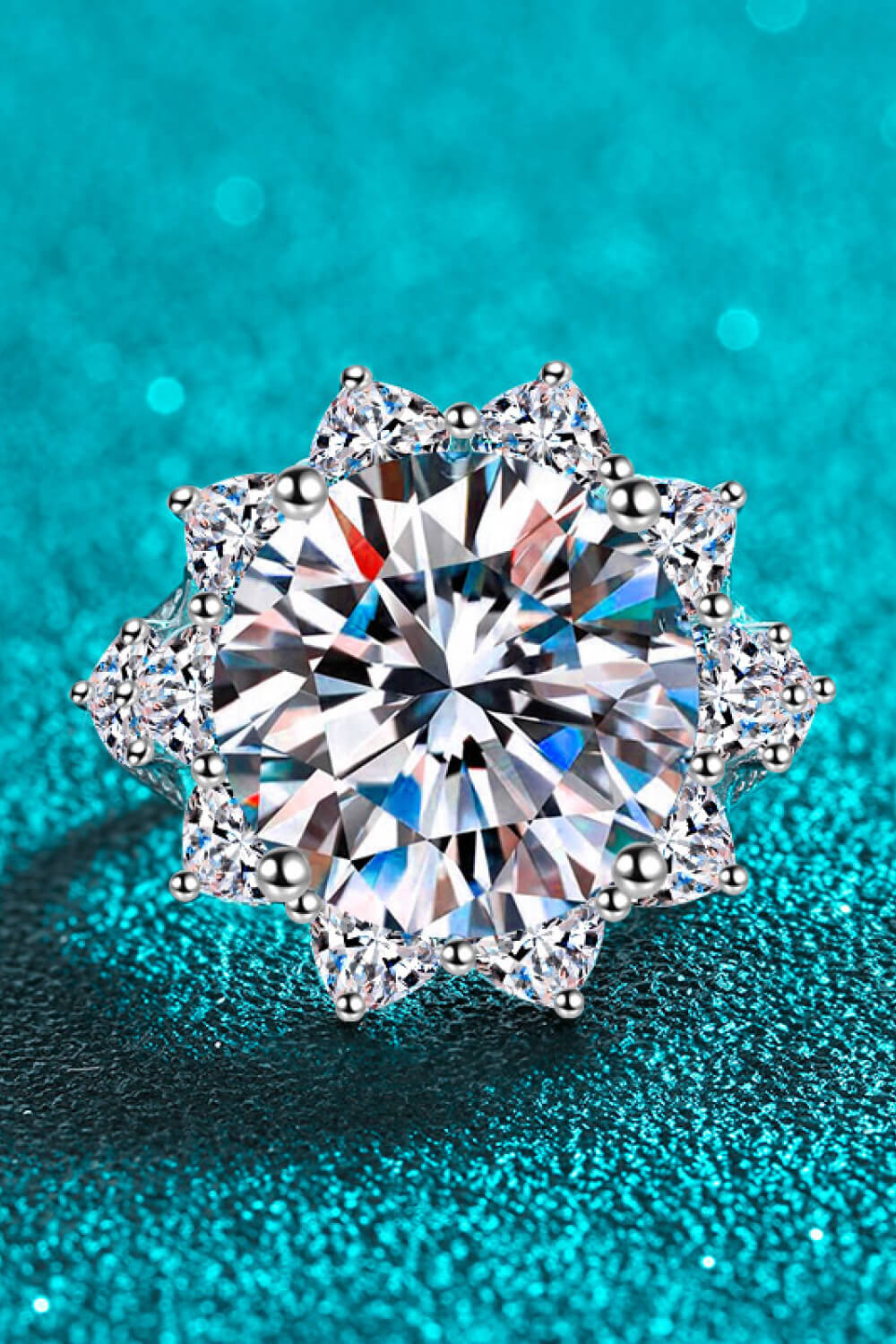 Top view of flower-shaped moissanite ring showing the central stone and surrounding accents