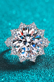 Top view of flower-shaped moissanite ring showing the central stone and surrounding accents