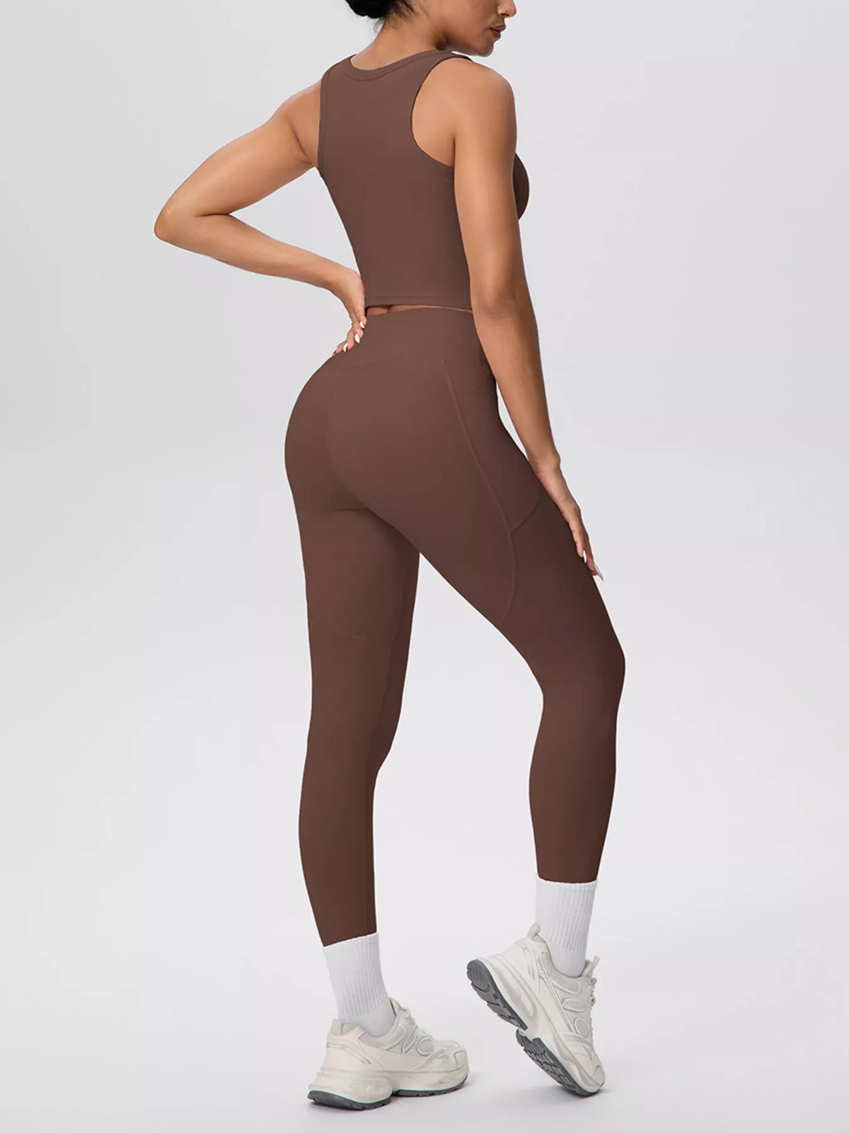 Brown activewear set viewed from behind at an angle