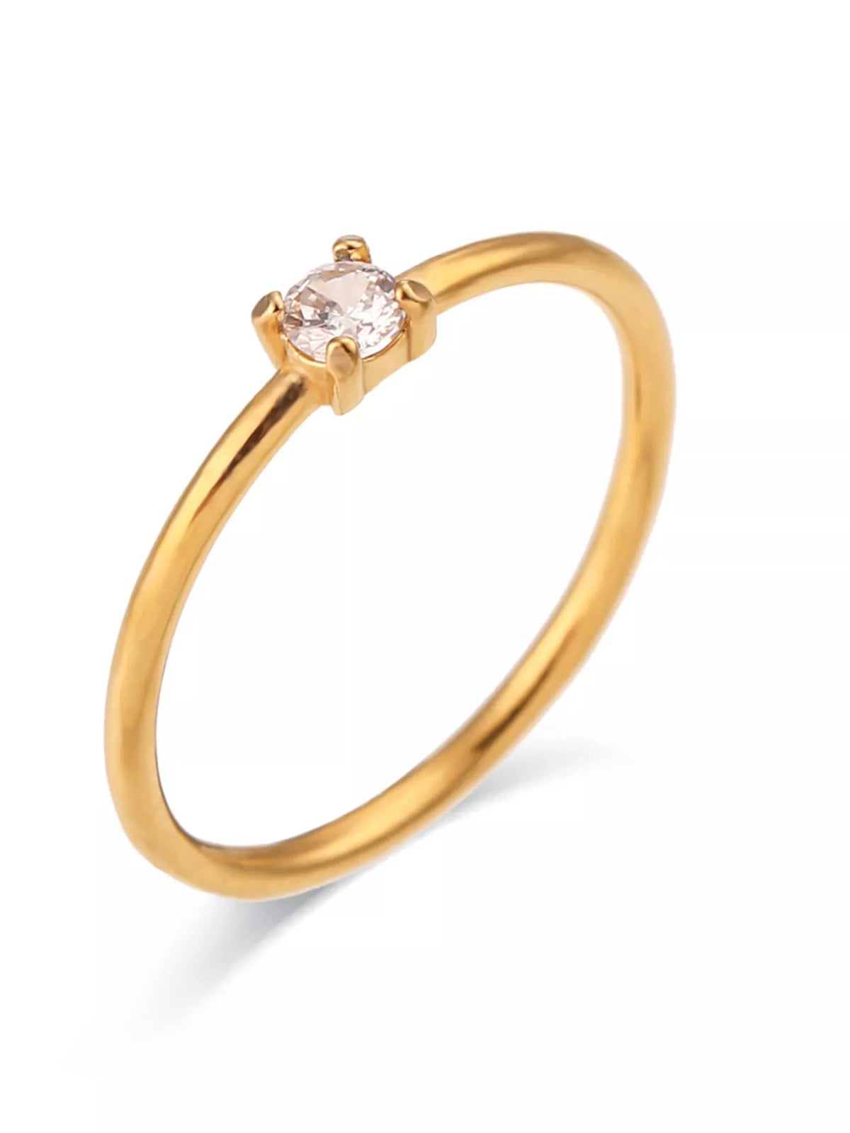 Gold-tone ring with a clear round stone, product view