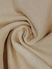Close-up of beige fabric from the halter-neck jumpsuit