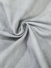 Close-up of gray washed knit fabric with soft cloudy finish