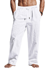 Model wearing white loose-fit pants, front view
