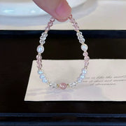 Pearl and crystal bracelet held up to show its full loop