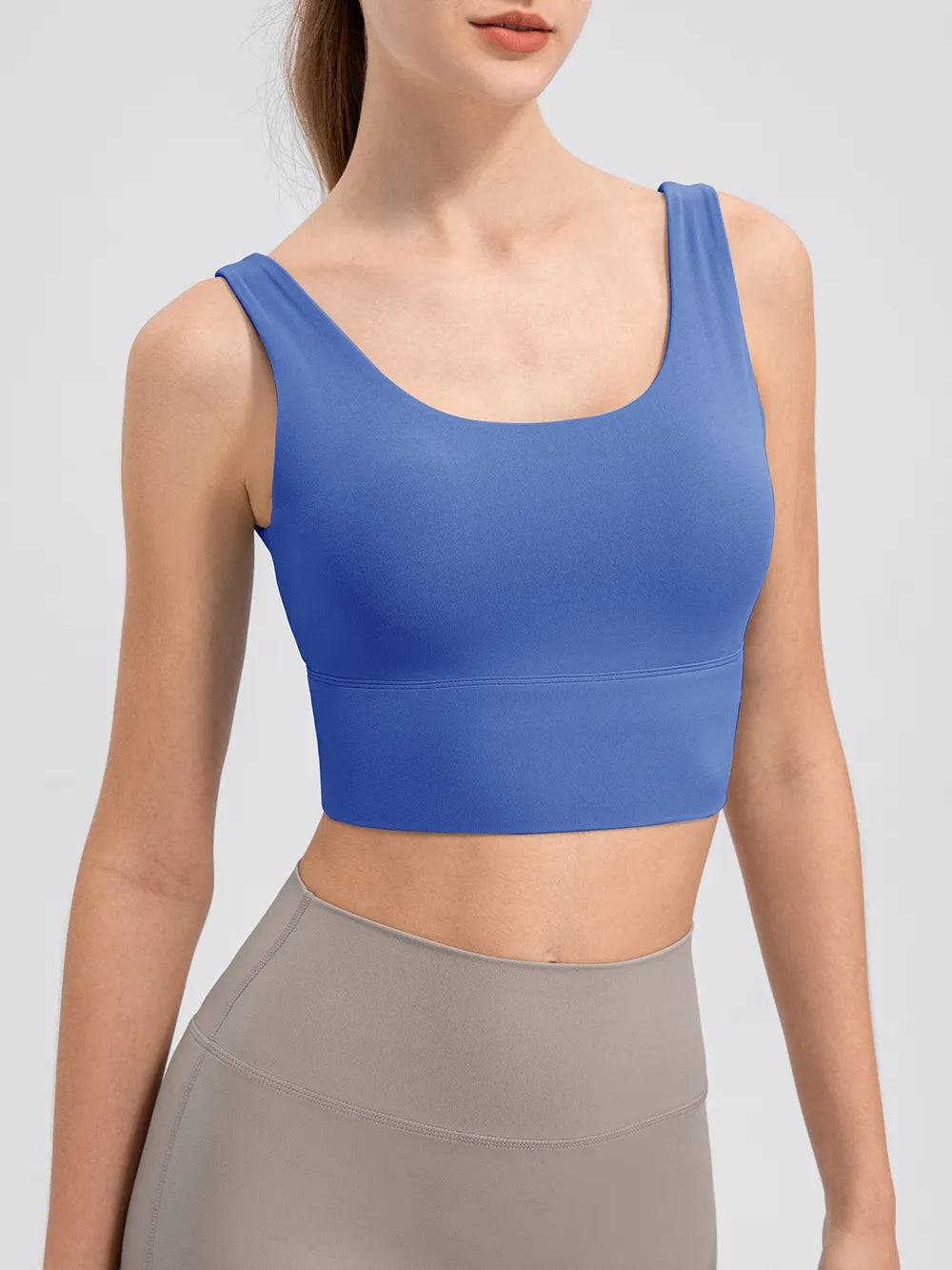 Blue wide-strap cropped tank with scoop neckline, front view