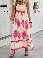 Pink floral-print smocked maxi dress, front view