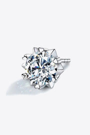 Single round clear-stone stud earring viewed at an angle