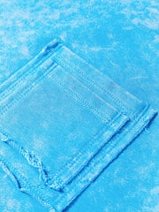 Women's mineral-wash blue raw-seam pocket sweatshirt, close-up of chest patch pocket