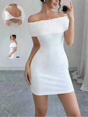 Front mirror view of a white mini dress with a wide off-shoulder neckline and fitted silhouette; inset shows crossed back straps.