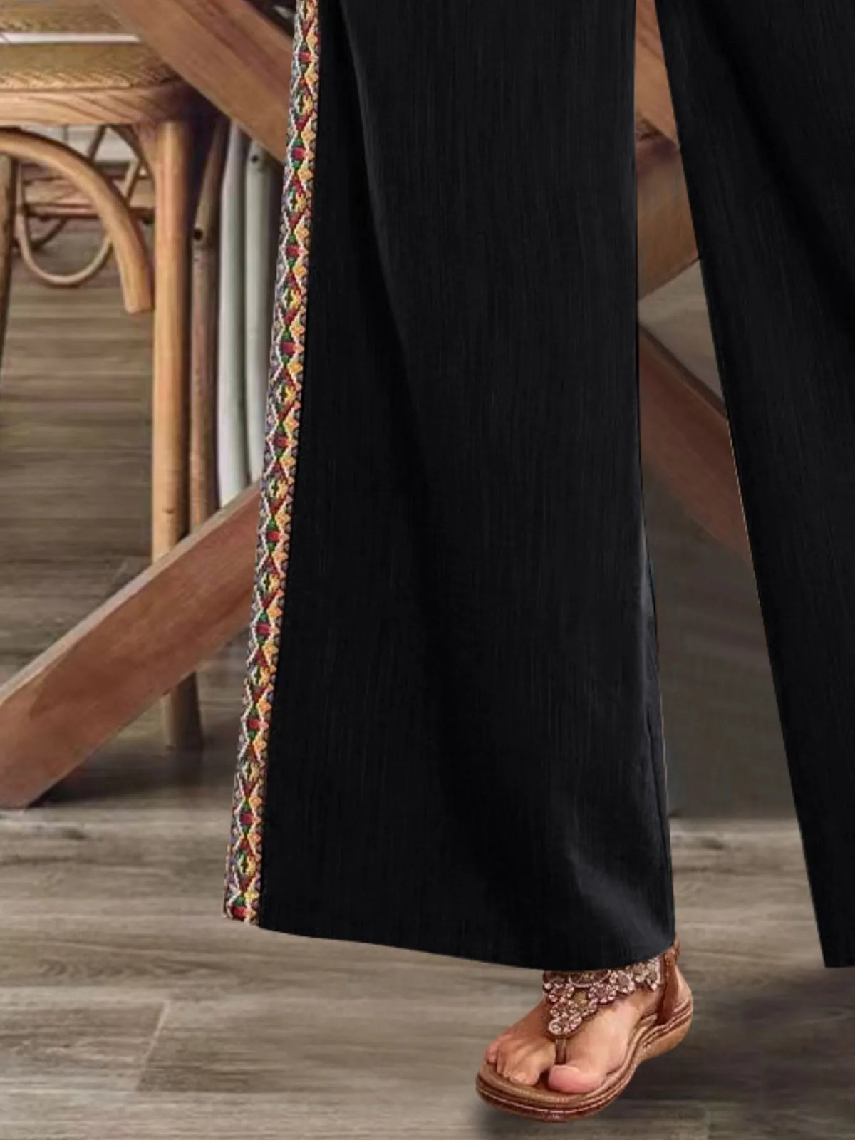 Close view of black side stripe and hem