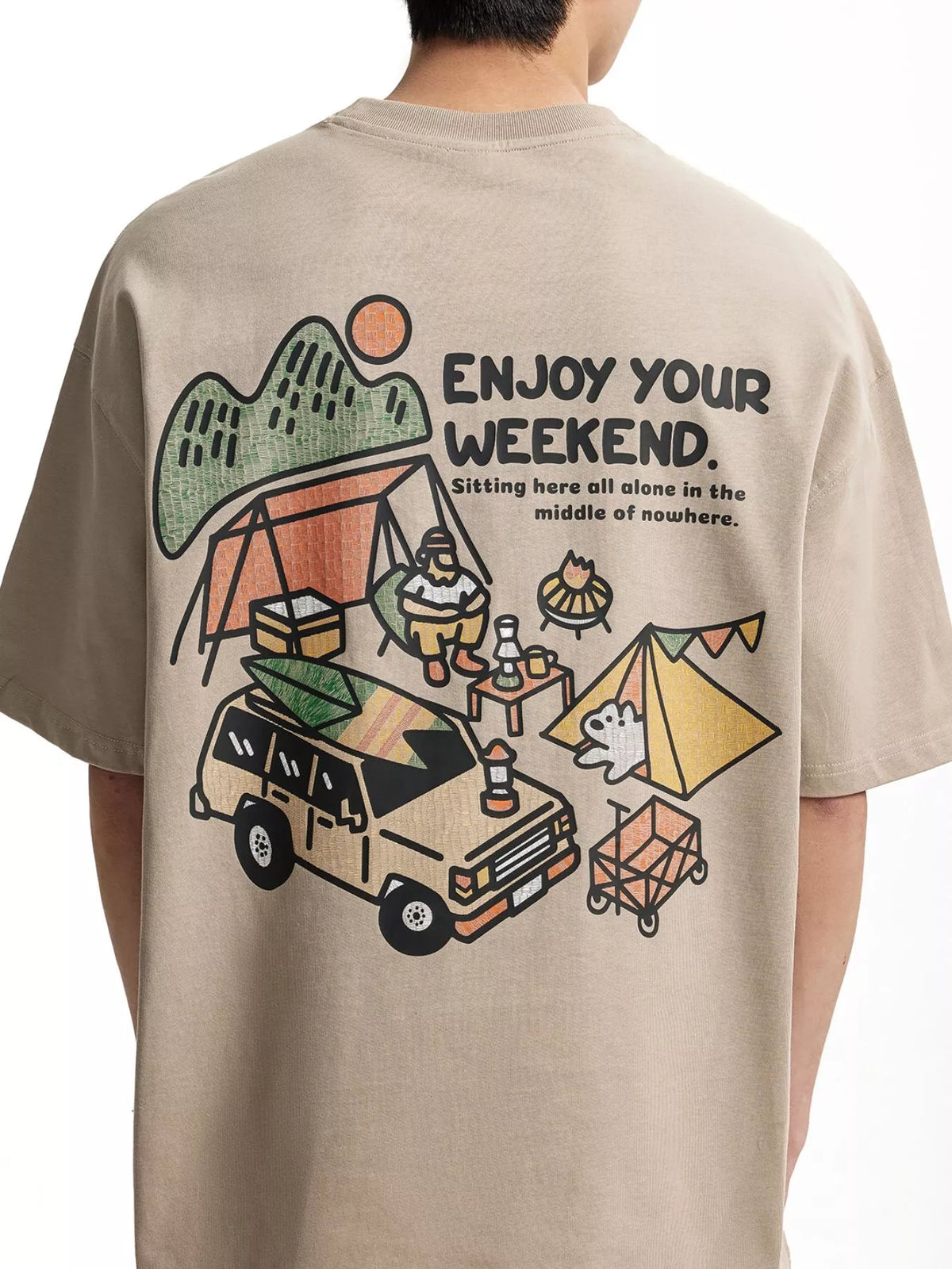 Back view of beige T-shirt with “Enjoy Your Weekend” camping illustration