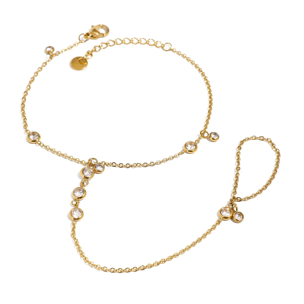 Close view of gold chain and clear stones