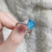 Cushion halo ring shown from the front with a slim pavé-set band.