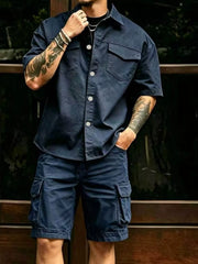 Model wearing navy cargo shirt and matching shorts