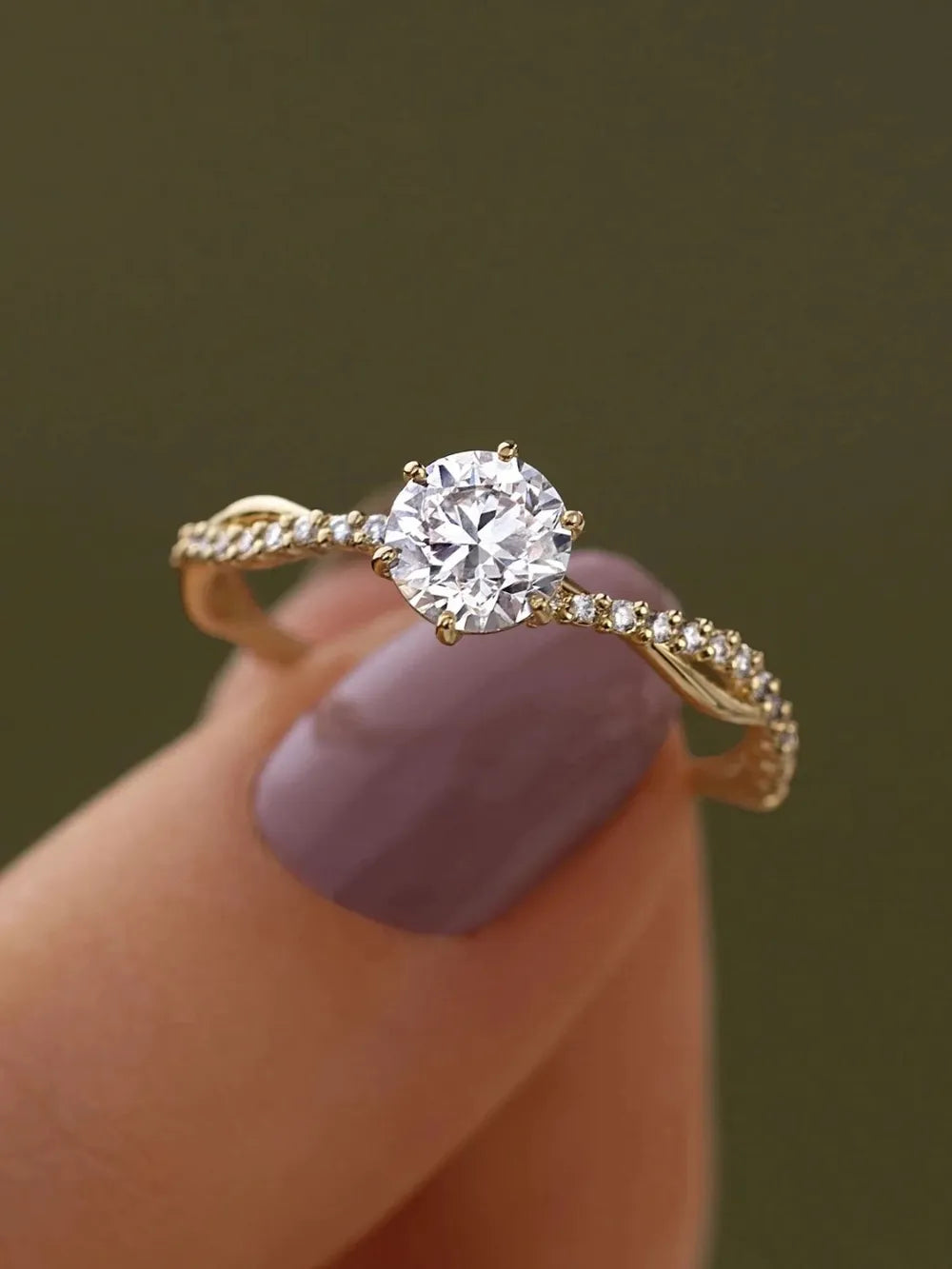 Gold-plated sterling silver zircon ring shown from above on white