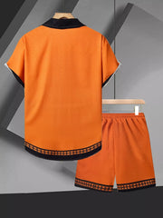 Back view of orange shirt and shorts with black geometric trim