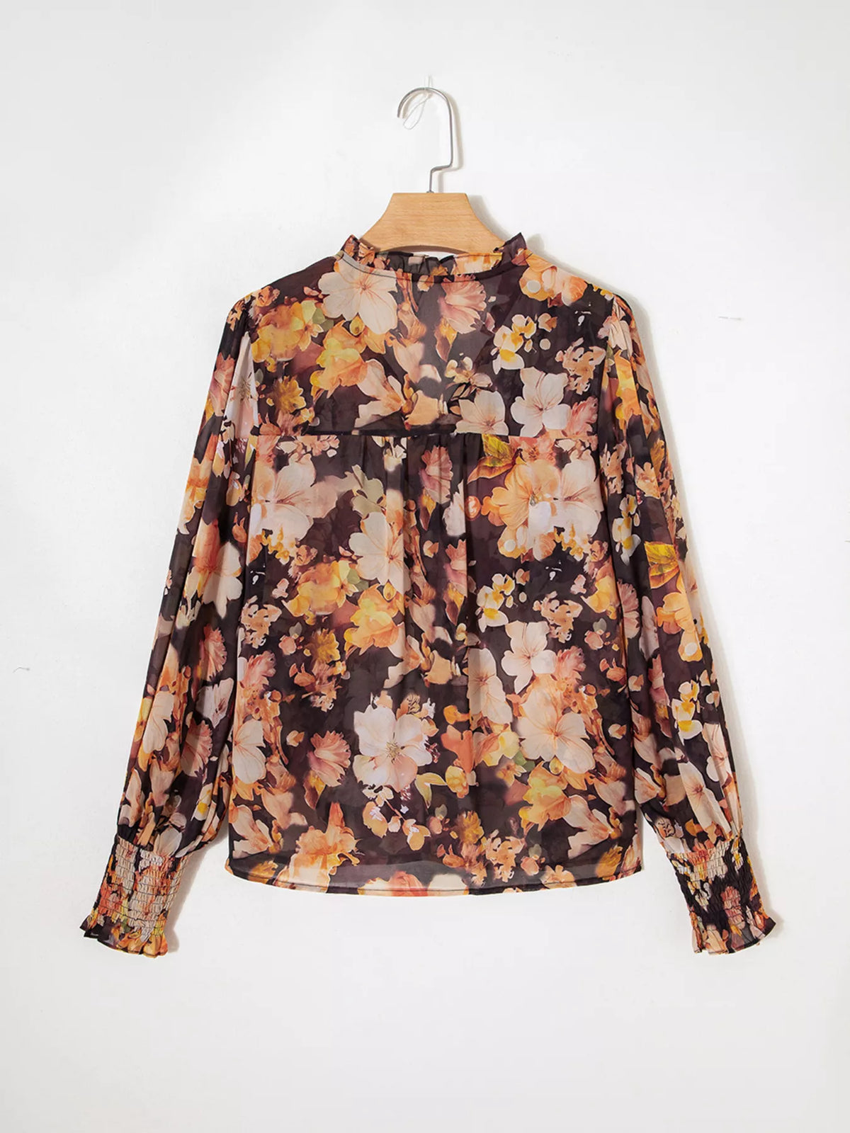 Women's floral V-neck puff-sleeve blouse, back hanging view