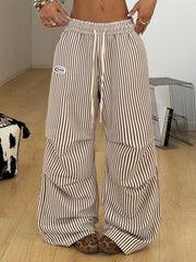 Front view of striped wide-leg pants with drawstring waist and side pockets