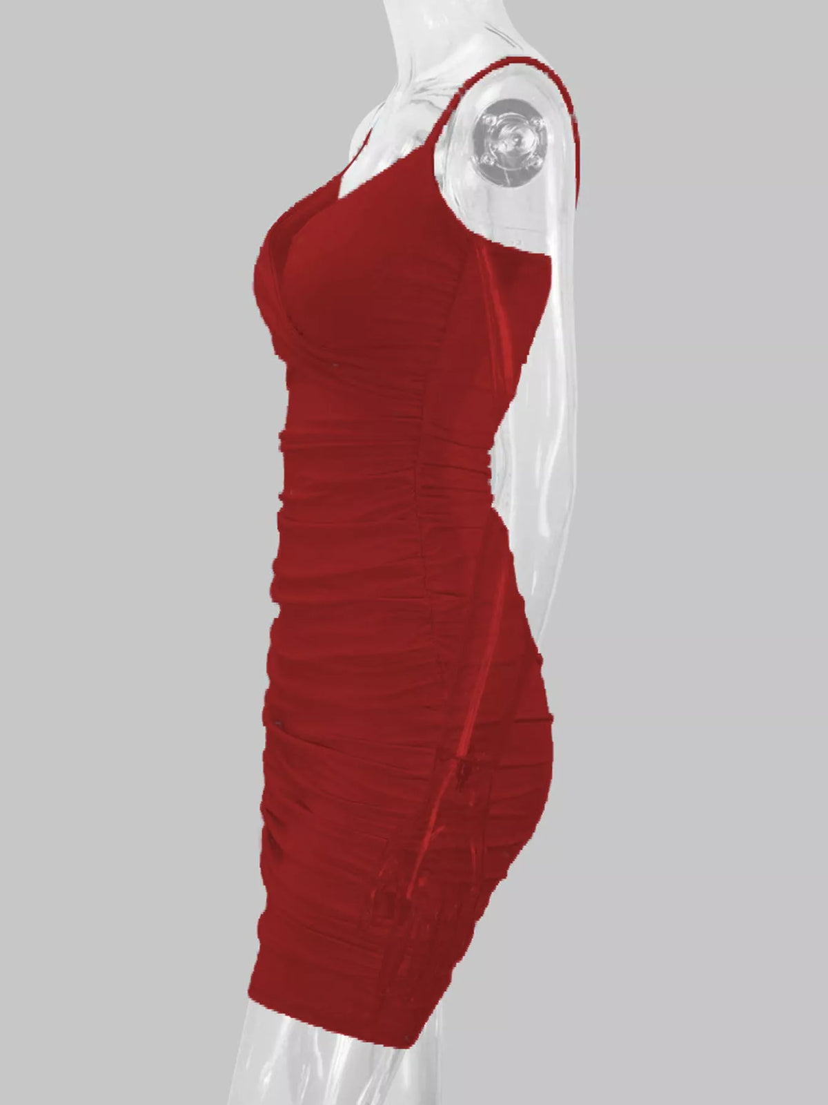 Side-profile mannequin view of the deep red bodycon mini dress, showing its fitted ruched silhouette.