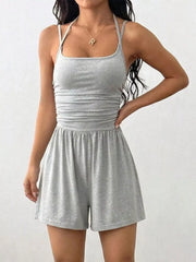 Women's ruched spaghetti-strap romper, light gray front view with hand at hip