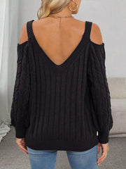 Back view of black cable-knit sweater showing V-shaped neckline and open shoulders