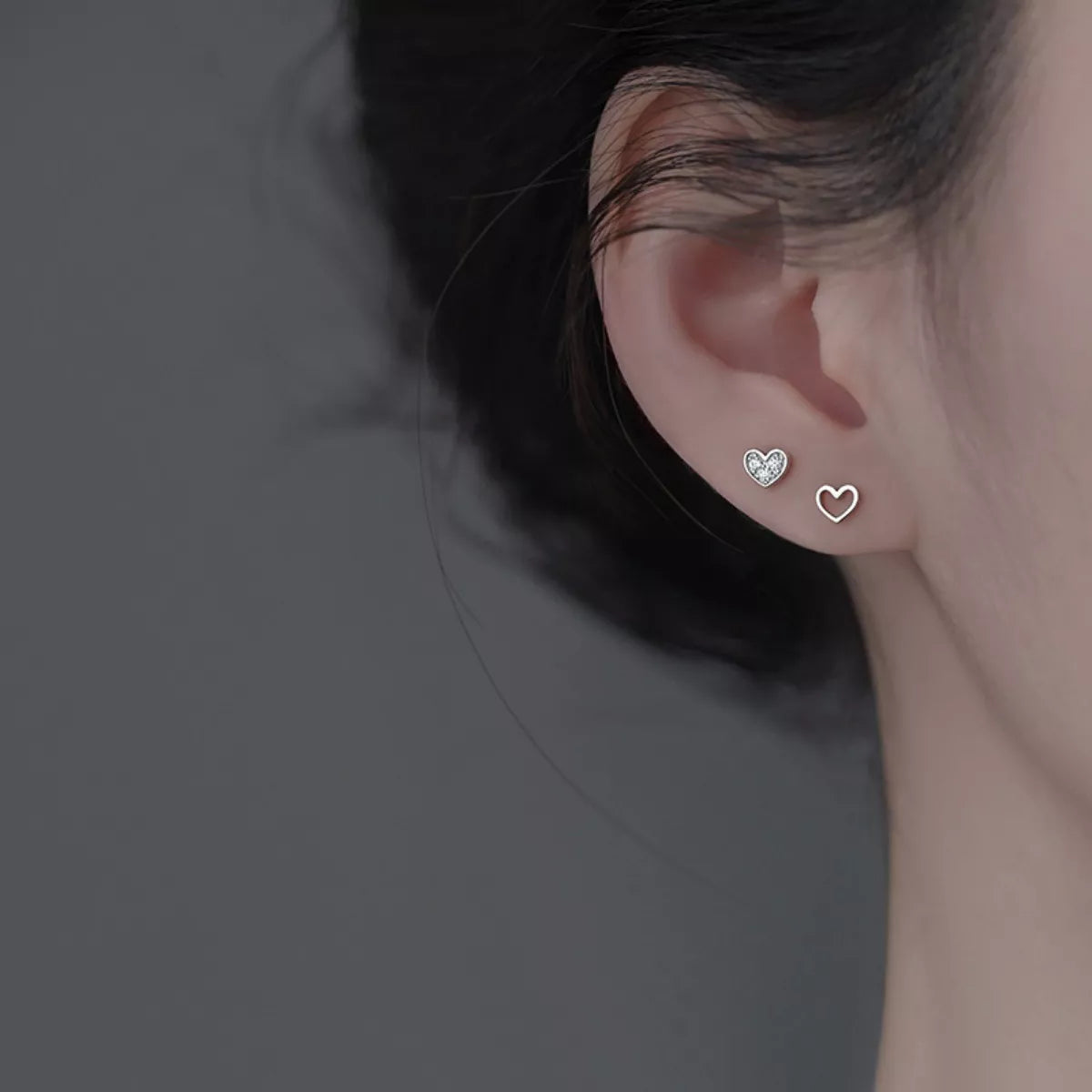 925 sterling silver heart stud earrings worn on ear