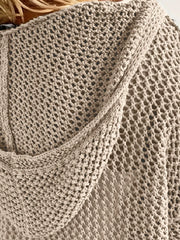 Close-up of the hood and open stitch pattern on a taupe knit cover-up.