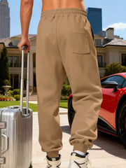Tan cargo joggers shown against a white background