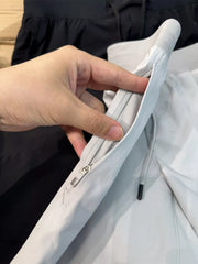 Close-up of shorts pocket and fabric detail