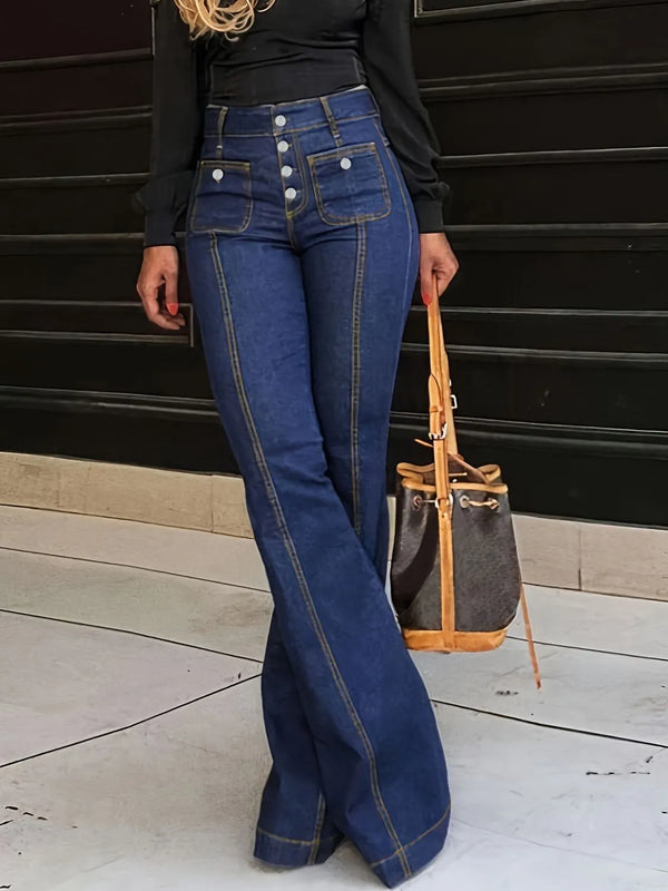 Dark blue flare jeans worn with black top, front view