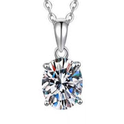 Moissanite stone detail in four-prong pendant setting