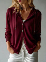 Sage hooded cardigan modeled with front buttons and drawstrings