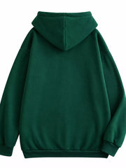 Back view of the dark green hoodie with large hood and ribbed hem