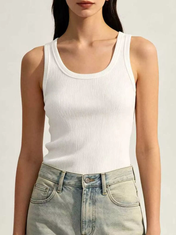 White ribbed U-neck tank front with light jeans
