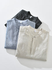 Blue and cream zip-up jackets shown together on hangers