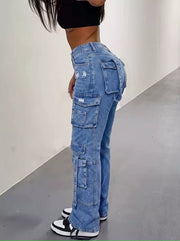 Side view of high-waisted blue cargo jeans showing stacked flap pockets