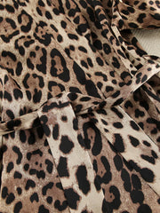 Close detail of leopard-print fabric folds and stitching