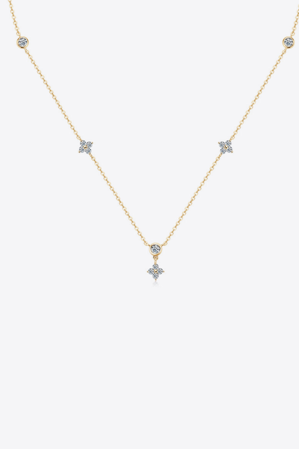 Fine silver-tone moissanite necklace arranged in a V on white background