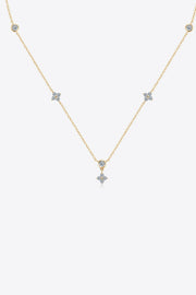 Fine silver-tone moissanite necklace arranged in a V on white background