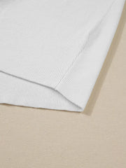 Close-up of ivory sweatshirt hem and seam