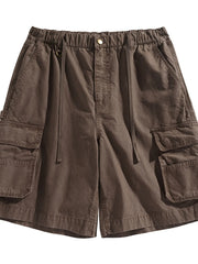 Brown cargo shorts with drawstring waist and flap pockets