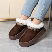 Pair of tan and brown faux-fur lined platform boots