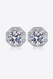 Pair of two-carat round moissanite stud earrings in silver-tone settings