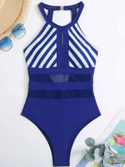 Blue-and-white striped one-piece swimsuit laid flat, showing the keyhole and sheer waist panels