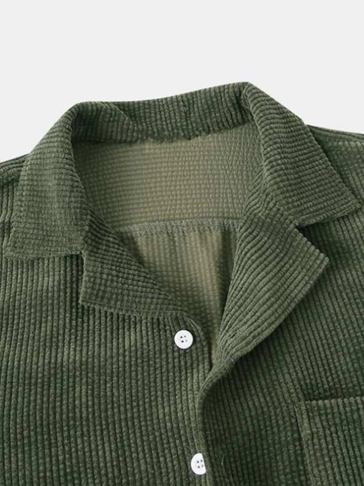 Close-up of olive textured collared shirt