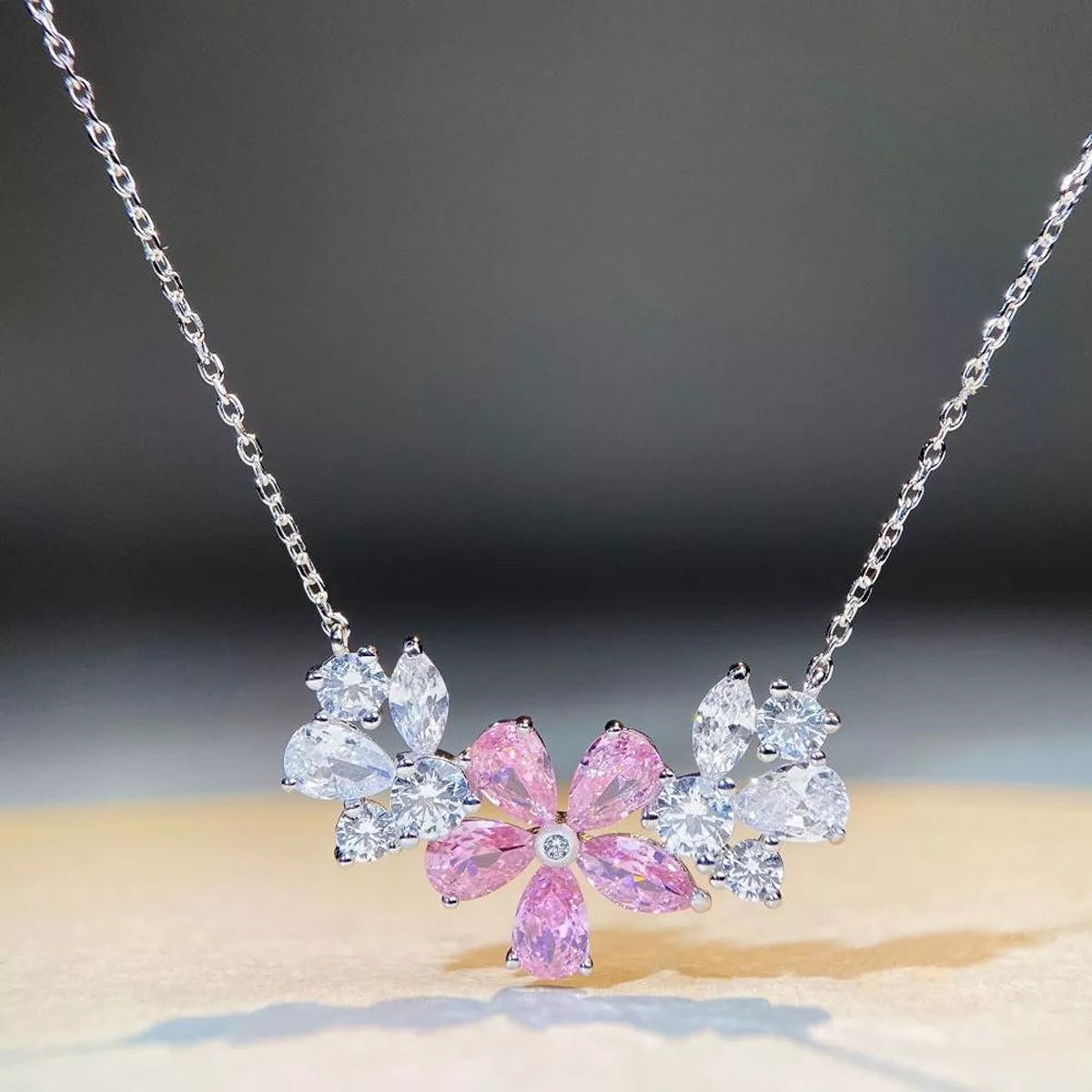 Silver-tone flower necklace with blush pink center stones