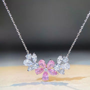 Silver-tone flower necklace with blush pink center stones
