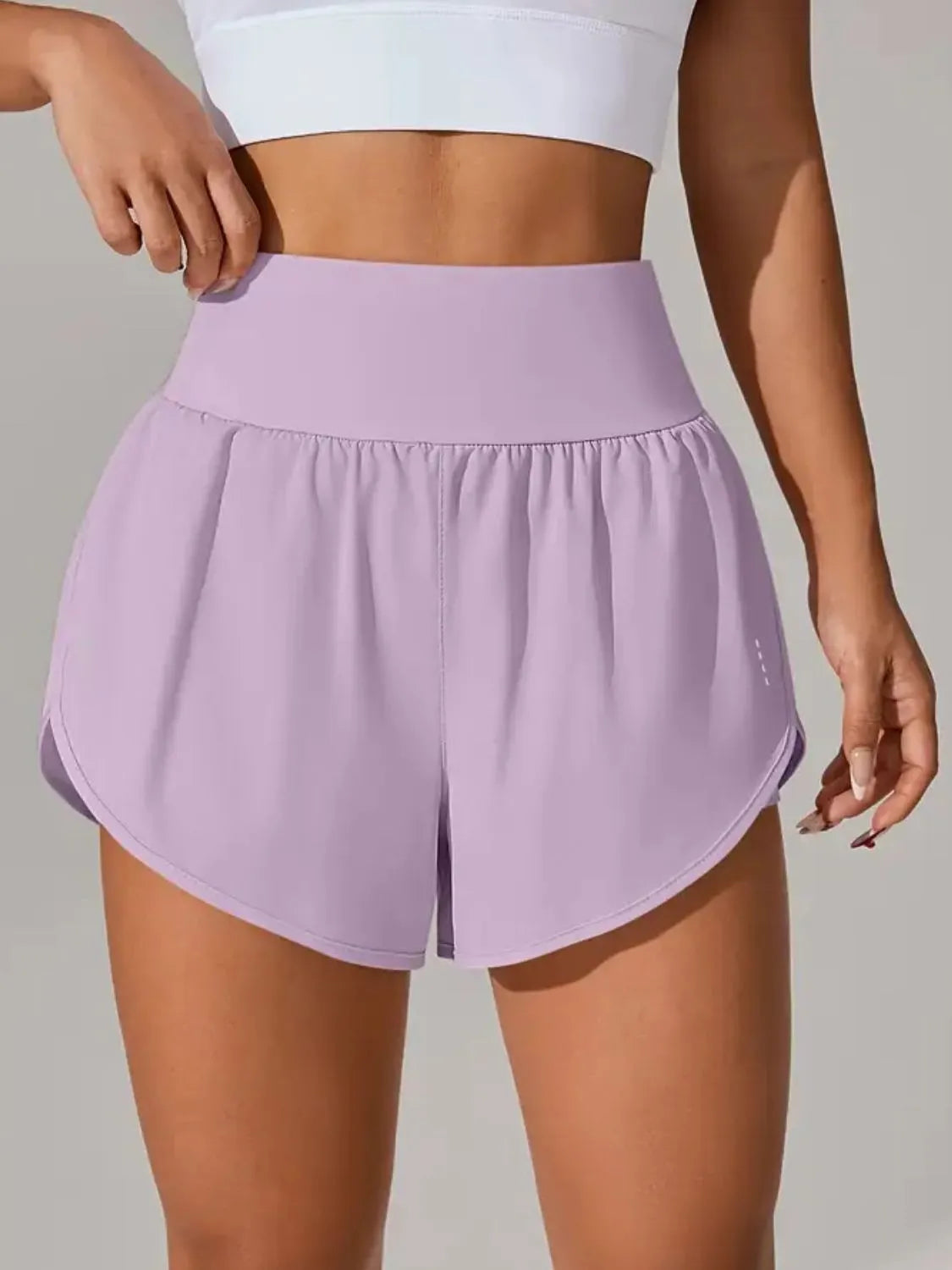 Rear view of lavender active shorts with wide waistband