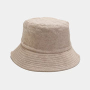 White wide-brim bucket hat shown from the front