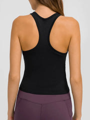 Back view of black racerback tank on model